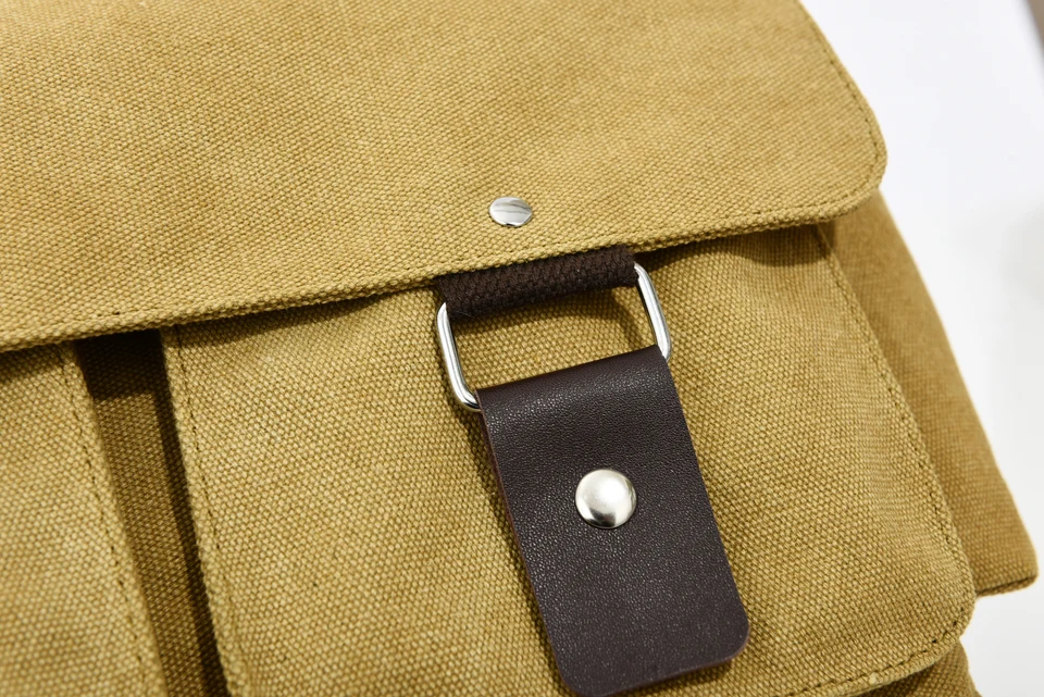 Close-up of a bag fastening, fabric and stitching.
